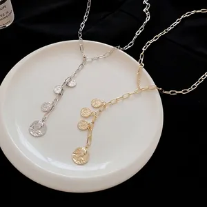 Elegant vintage round coin portrait tassel necklace for women in gold and silver finishes