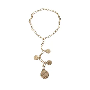 Elegant gold-tone portrait coin medallion tassel necklace on a clean white background