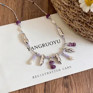 Elegant acrylic and pearl beaded necklace with silver-toned accents for women