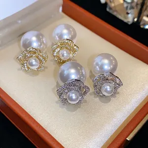 Elegant 14k gold plated flower pearl stud earrings with crystal accents in a luxury gift box