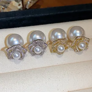 Elegant 14k gold plated flower stud earrings with large double-sided pearls for women