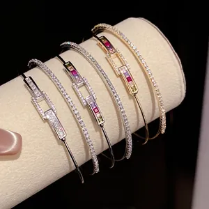 Detailed view of 18k gold plated zircon bracelets featuring a rectangular link design
