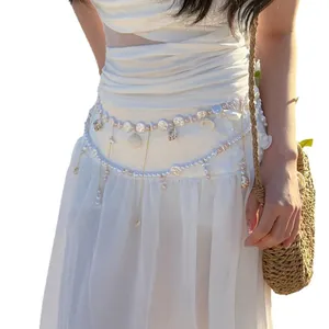 Beach vacation style pearl waist chain with flower charms and shell tassels