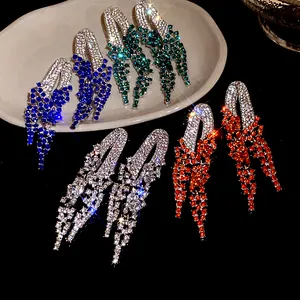 Detail showing elegant geometric rhinestone tassel earrings in multiple vibrant colors