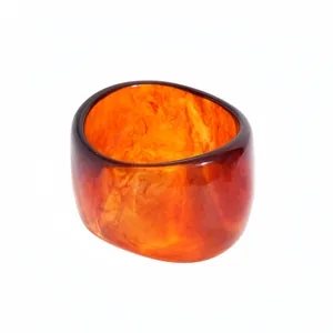 Wide irregular geometric resin bangle with amber tortoiseshell texture for women