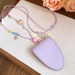 Elegant purple leather sunglasses holder necklace featuring starfish and seashell charms
