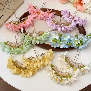 Elegant fabric floral hairpins in multiple colors for aesthetic hair styling.