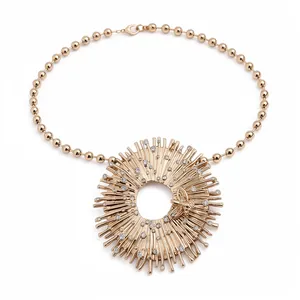 Luxury gold beaded necklace featuring a radiant diamond-set bee circle pendant charm