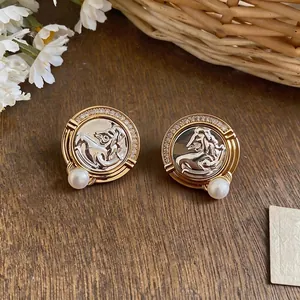 Vintage French horse head earrings featuring round zircons and elegant pearls accents