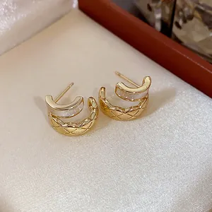 Elegant 18k gold plated C-shaped hoop earrings with quilted pattern and white inlay