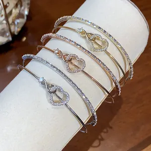 Elegantes brazaletes de circonita con corazón e infinito en oro, rosa y plata pura