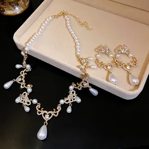 Elegant pearl and rhinestone water drop pendant jewelry set with necklace and earrings