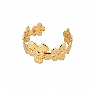 Eleganter goldfarbener Blumen-Armreif für Damen im minimalistischen Vintage-Stil