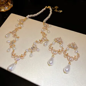 Luxury vintage gold-tone rhinestone pearl necklace and earrings set with teardrop pendants