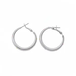 Minimalist silver hoop earrings featuring vibrant multicolored polka dots on a white background.