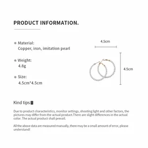 Product specifications for vintage pearl hoop earrings made of copper and imitation pearls