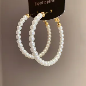 Elegant French vintage pearl beaded hoop earrings with gold-toned metal accents