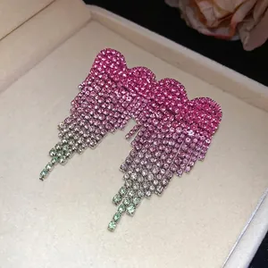 Luxury pink gradient rhinestone heart tassel drop earrings displayed in jewelry box