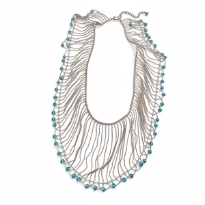 Elegant silver-tone fringe necklace with blue crystal beads in a layered mesh design