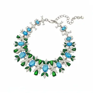 Elegantes Vintage-Zirkonia-Armband mit grünen und blauen Steinen im Blumen-Design