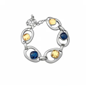 Bracelet vintage chic à maillons ovales évidés serti de pierres jaunes et bleues