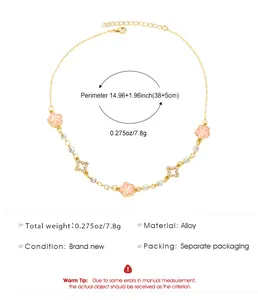 Vue détaillée du collier pendentif fleur rose et étoile avec les spécifications.