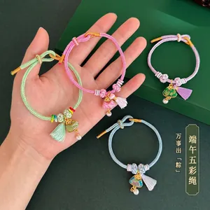 Handmade woven colorful cord bracelets with Song brocade triangular charms and tassels.