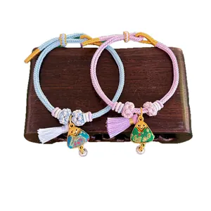 Hand-woven Song Brocade triangle charm bracelets with colorful ropes in vintage style.