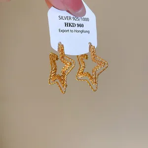 Exquisite textured 18k gold plated star earrings featuring silver needles for sensitive ears.