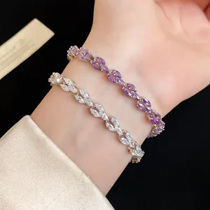 Detailed view of elegant marquise-cut zircon bracelets in clear and purple stones