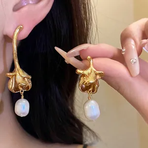 Vintage gold flower earrings with freshwater pearl drops for elegant look
