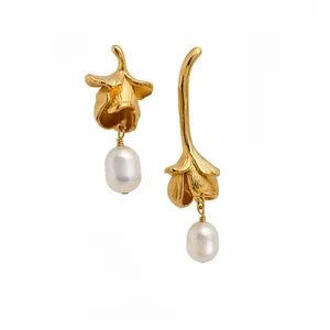 Vintage asymmetric gold flower earrings with elegant freshwater pearl drops
