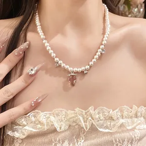 Sweet pearl necklace with pink strawberry pendant for women, clavicle chain detail view