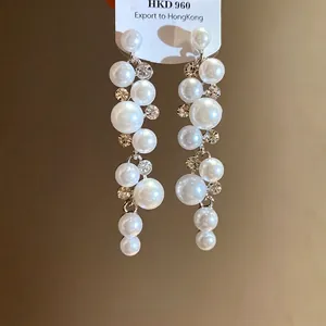 Elegant pearl and rhinestone drop earrings with silver needles for women