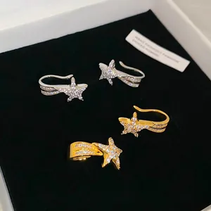 Elegante Sternschnuppen-Ohrklemmen mit funkelnden Kristallen in Gold und Silber