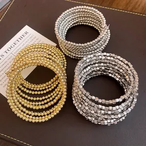 Multi-layer wrap bracelets with round and square beads in gold and silver finish