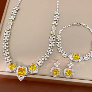 Detail shot of palace-style jewelry set with yellow square zircon stones
