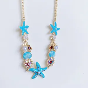 Summer vacation style starfish and pearl necklace with blue enamel and red gemstones
