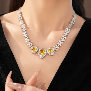 Detailed view of luxury necklace featuring square yellow zircon in elegant court style