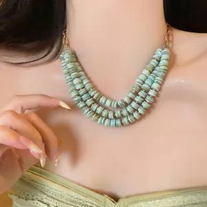 Three-strand shell bead collarbone necklace with vintage ethnic style in mint green