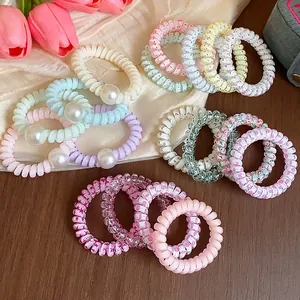Farbenfrohe Spiral-Haargummis im Dopamin-Stil mit Perlen und verschiedenen Mustern