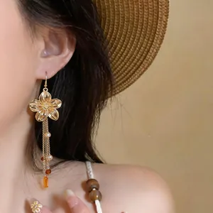 French retro style gold flower earrings with long tassels and glass beads