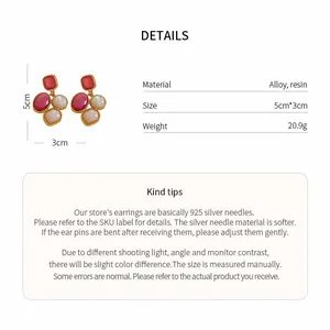 Detailed view of vintage resin oval earrings with material and size specifications