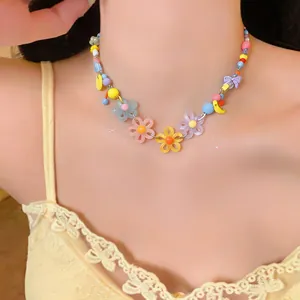 Detailed view of colorful daisy beaded necklace in vibrant dopamine style for summer