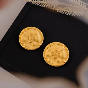 Vintage gold round stud earrings with intricate spiral clover patterns for women