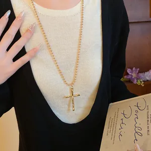 Vintage gold cross pendant necklace on ball chain for women's elegant fashion style