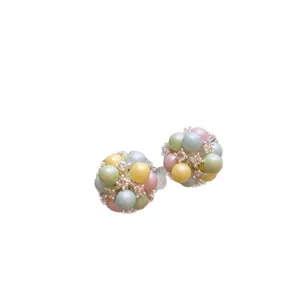 Pastel colored acrylic bead cluster stud earrings with rhinestones on white background