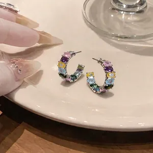 Dopamine style colorful C-shaped hoop earrings with oval zircons and silver needles