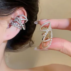 Detailed view of luxury zircon multi-layer hollow ear cuff in gold and silver finishes