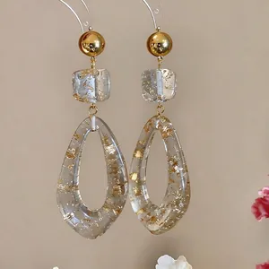 Elegant minimalist resin irregular drop earrings with gold foil details and silver needle